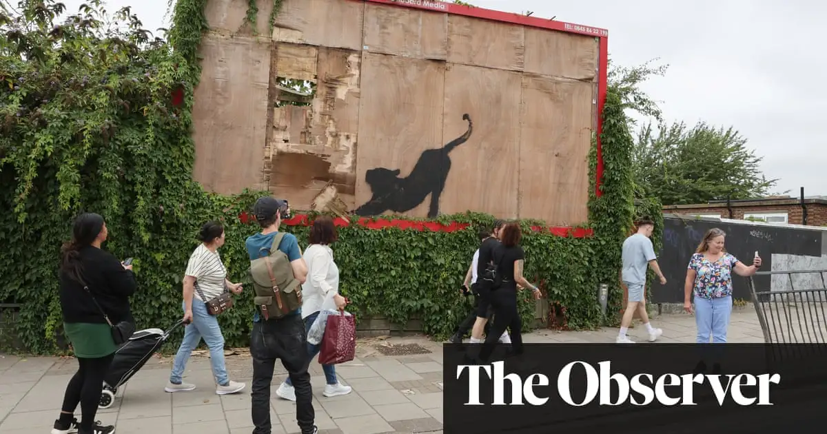 Banksy’s billboard cat removed as meaning of his London animals revealed