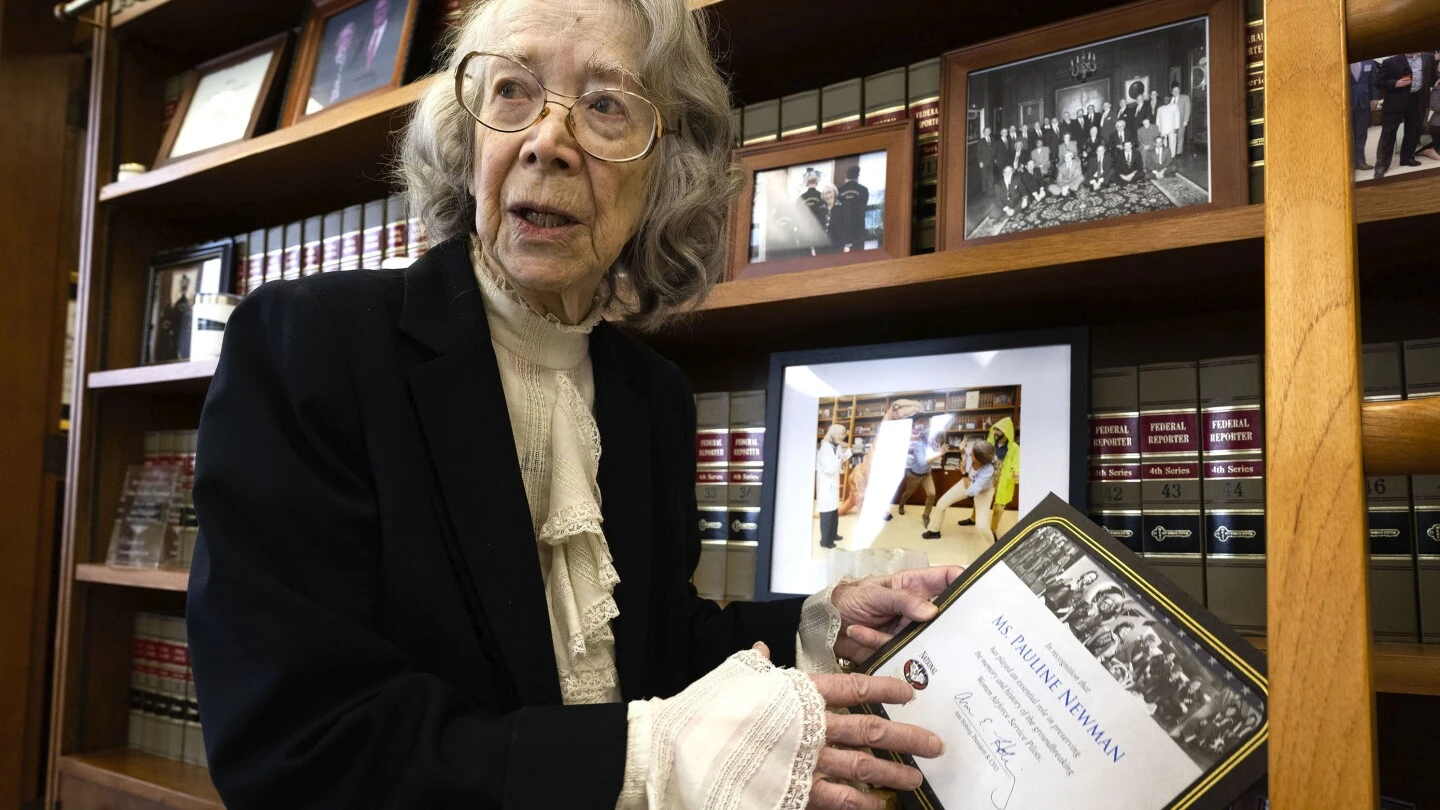 A 96-year-old federal judge is barred from hearing cases in a bitter fight over her mental fitness