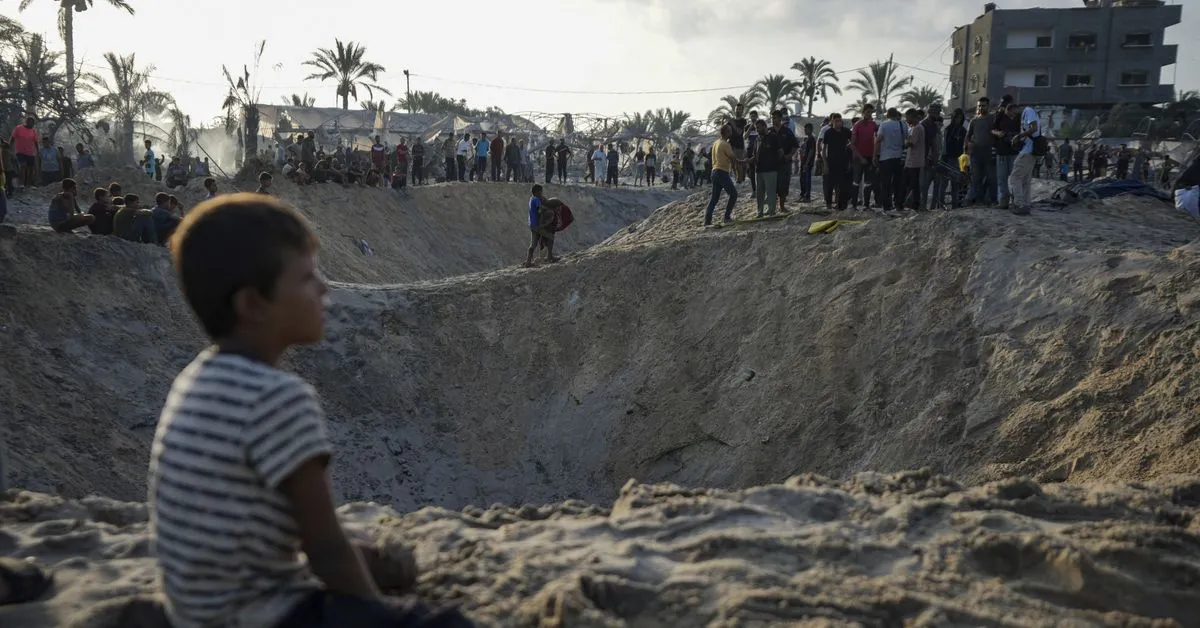 Israeli strike on Gaza tent camp kills at least 19, wounds 60