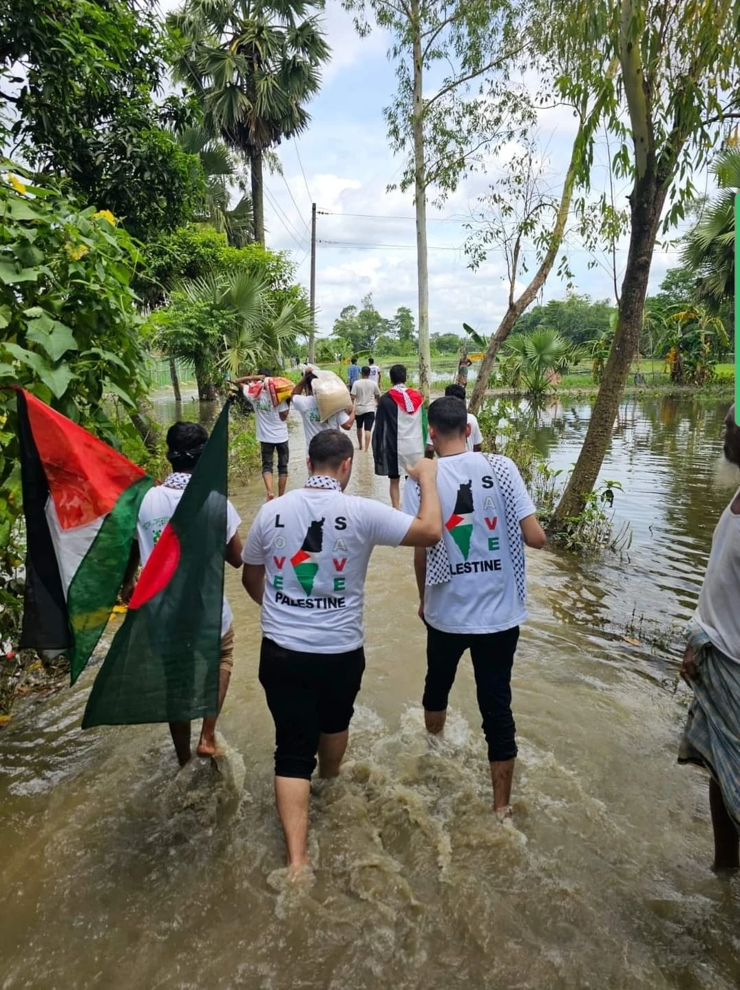 Palestine students working in a flood affected area. 