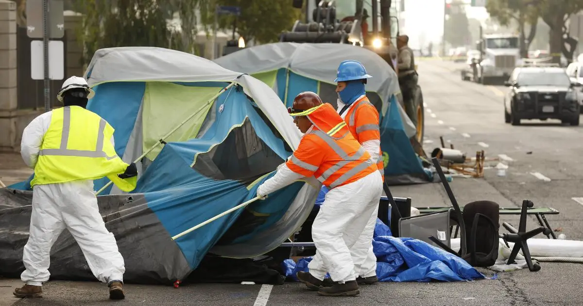 A federal judge has found that L.A. city officials doctored records in a case over homeless camp cleanups