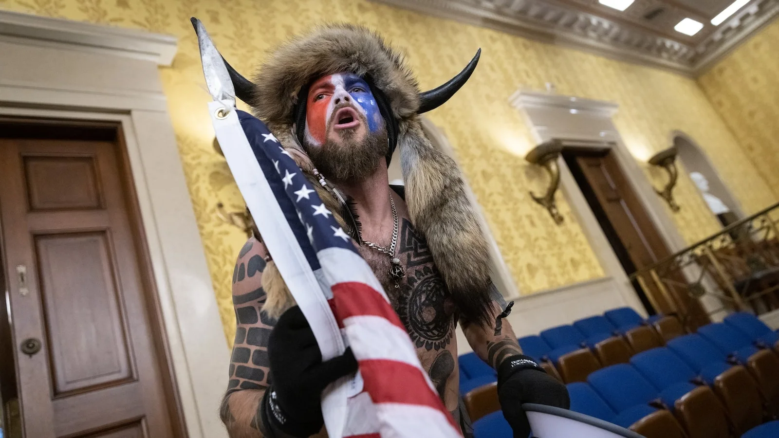 Judge orders Justice Department to return helmet, spear to 'QAnon Shaman'