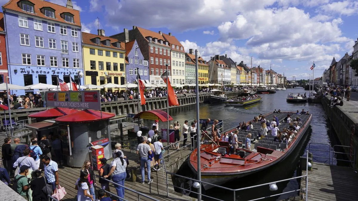 Southern European tourists flock to Denmark to escape the heat