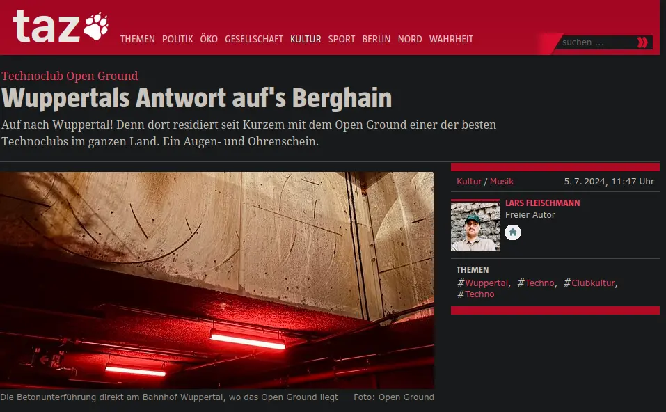 Bild von Betondecke mit roten Lampen. Untertitel "Die Betonunterführung direkt am Bahnhof Wuppertal, wo das Open Ground liegt"