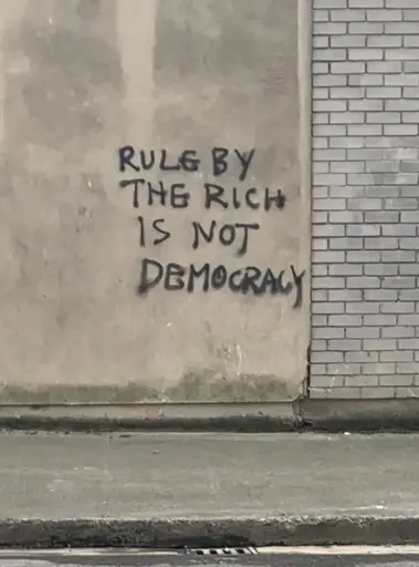 Graffiti Rule by The Rich Is Not Democracy