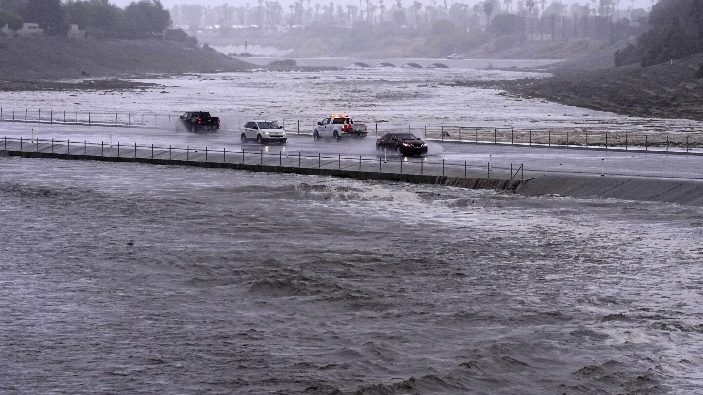 Rain from Tropical Storm Hilary lashes California and Mexico, swamping roads and trapping cars