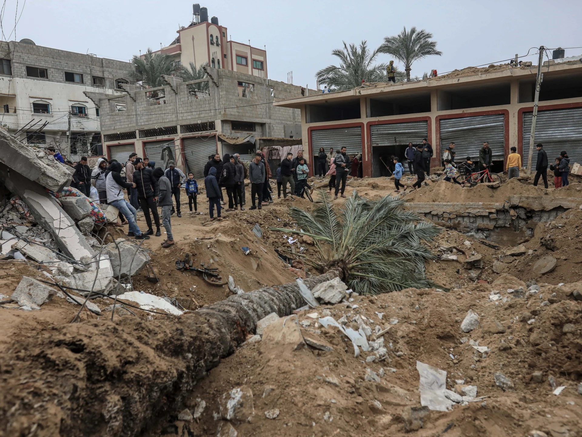 Photos: Israel bombs homes in central Gaza, killing several families