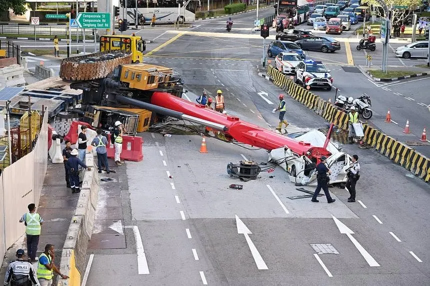 Driver jumps out seconds before van crushed by falling crane in Sengkang, crane operator arrested